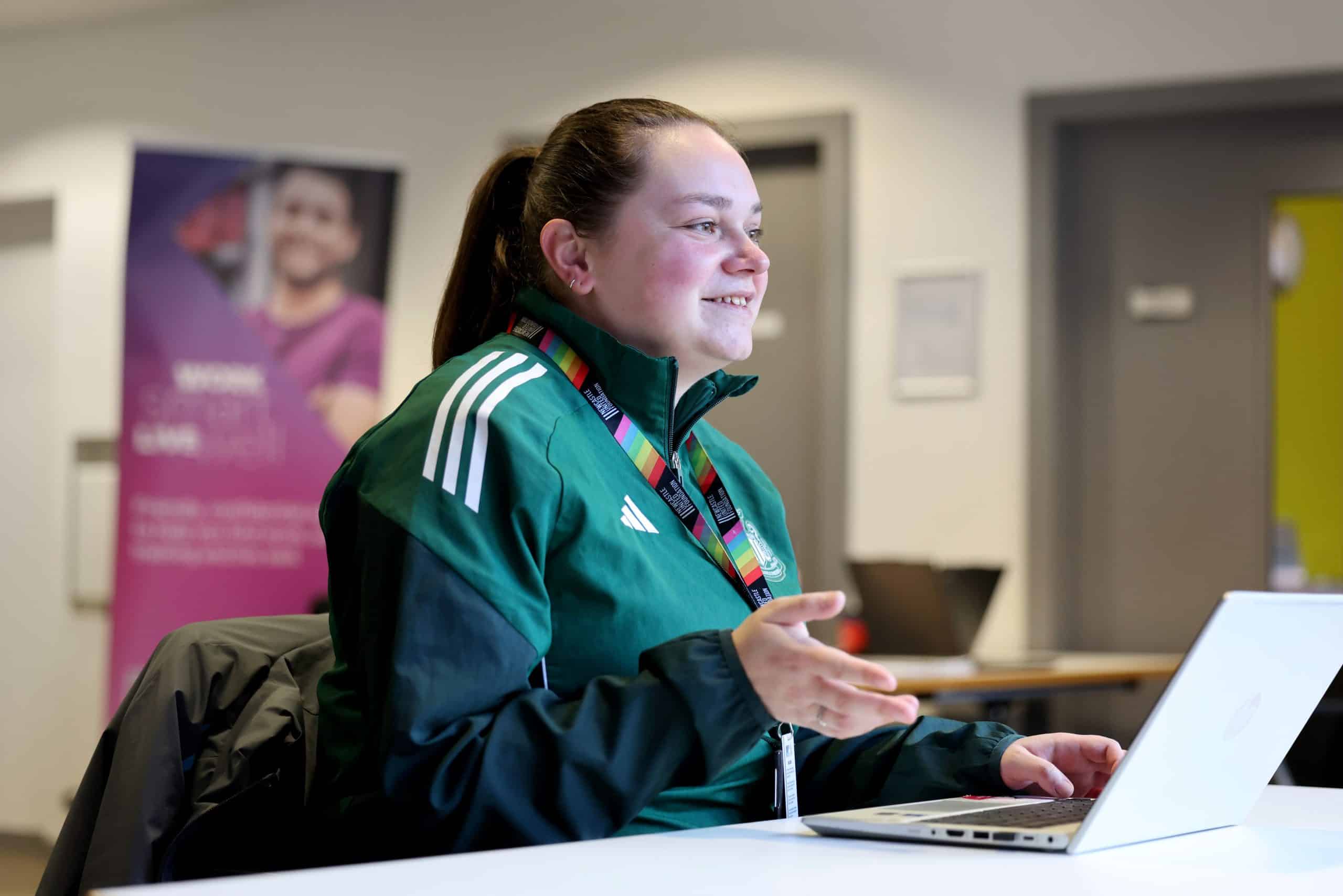 Woman sat at a desk with laptop